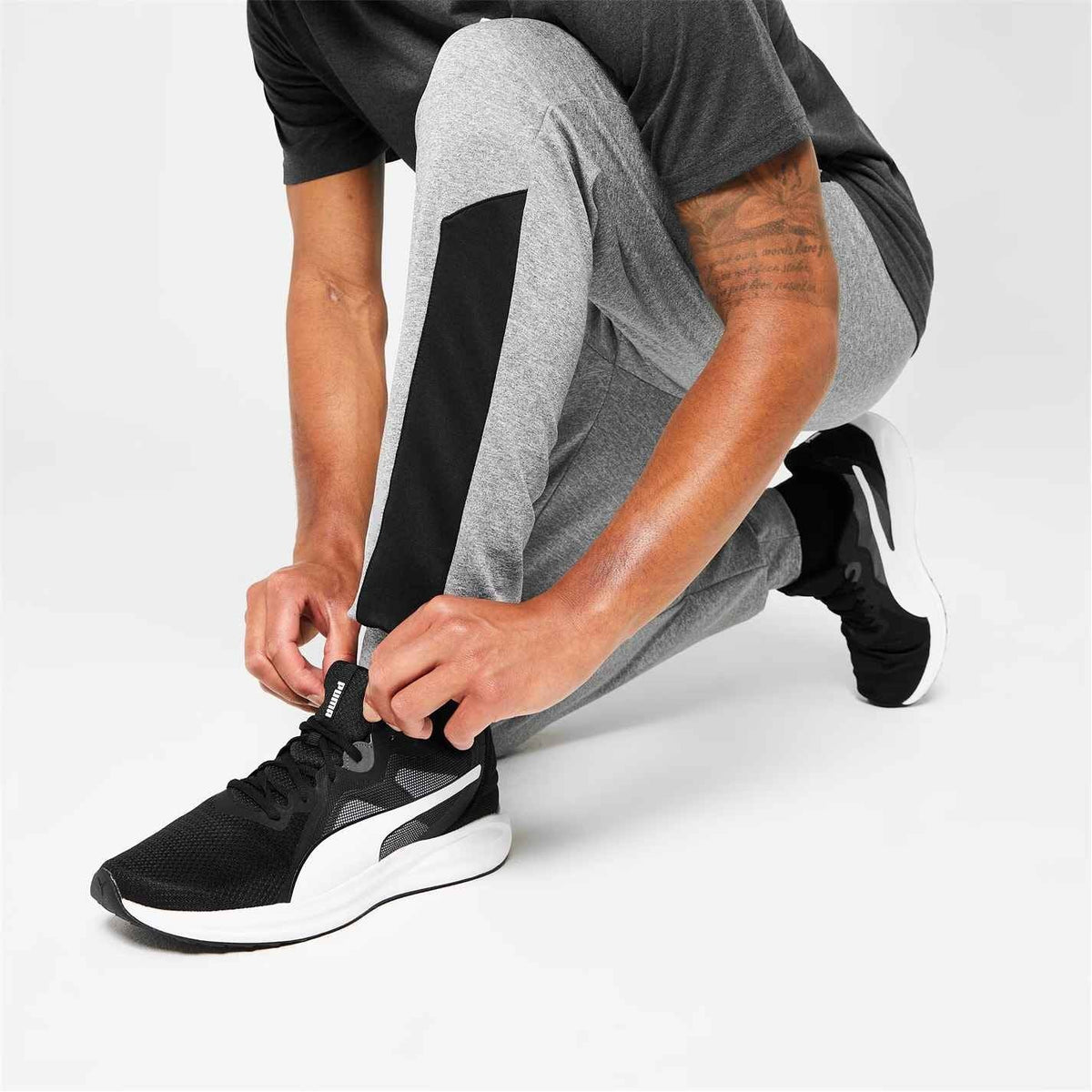 Runner lacing a trainer