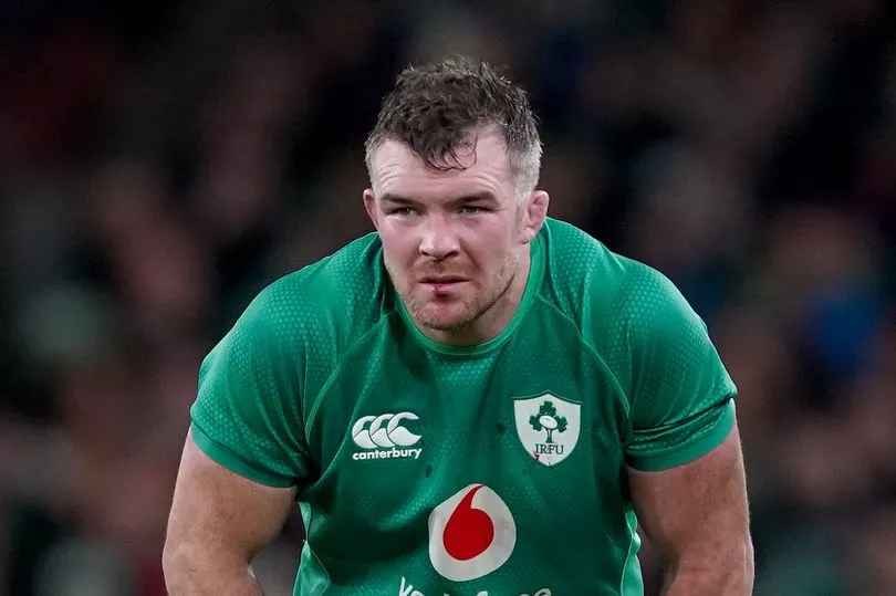 Rugby player in a green jersey