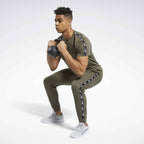 Training_Essentials_Tape_T-Shirt_Green_GQ4207_02_standard